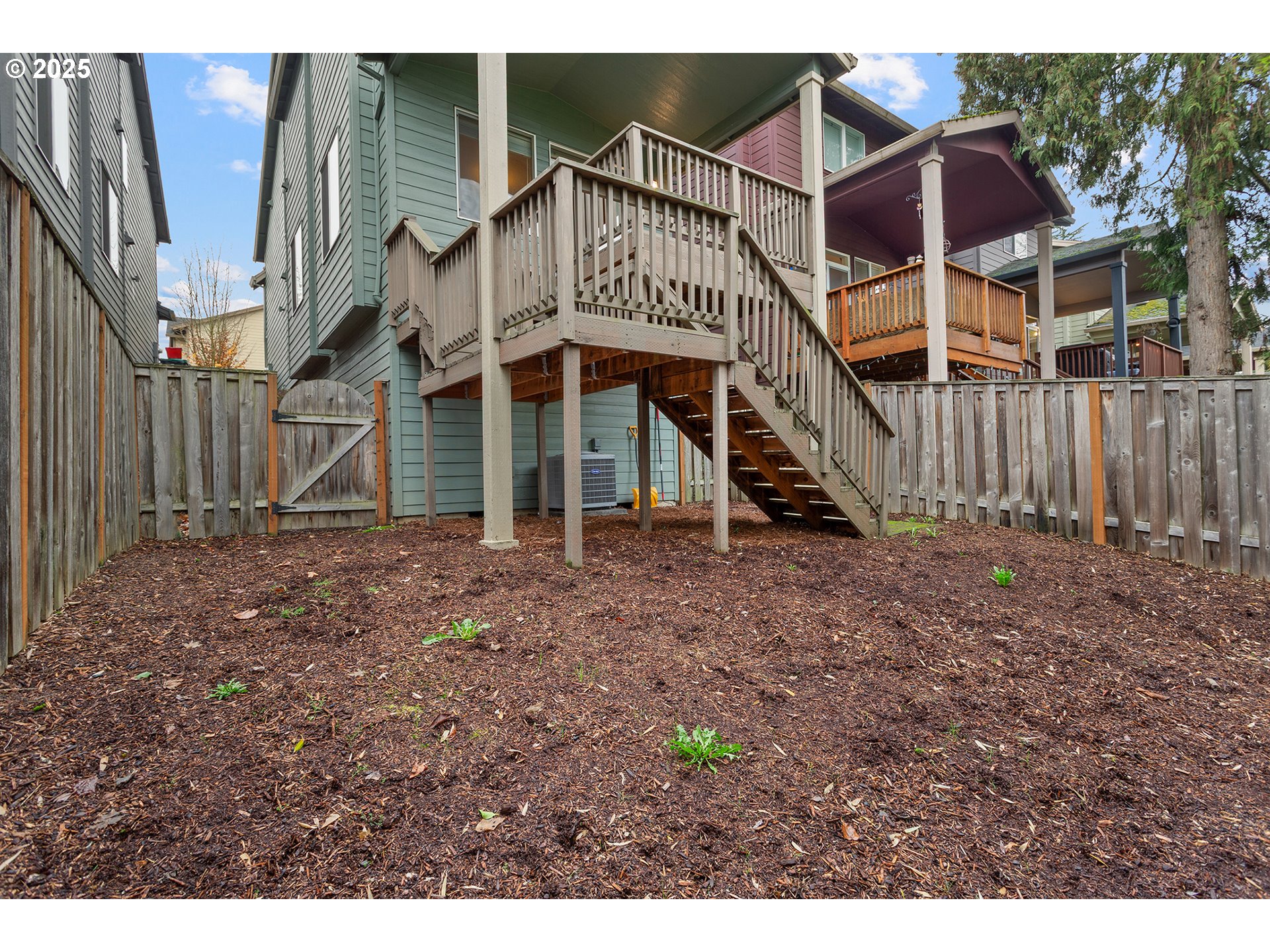 9622 Southwest Everett Terrace Tigard, OR 97223 - Photo 22 of 43 a view of a house with a yard