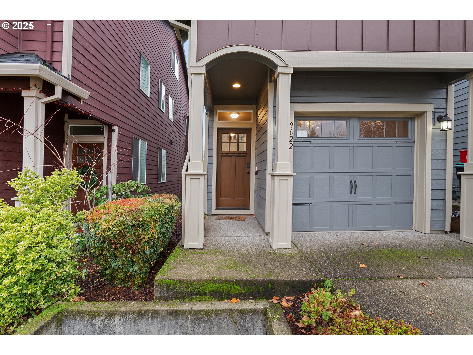 9622 Southwest Everett Terrace Tigard, OR 97223 - Photo 3 of 43 a front view of a house with garden