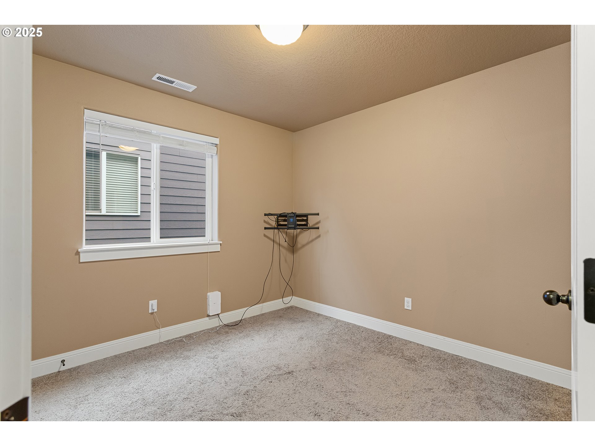 9622 Southwest Everett Terrace Tigard, OR 97223 - Photo 31 of 43 a view of an empty room with a window