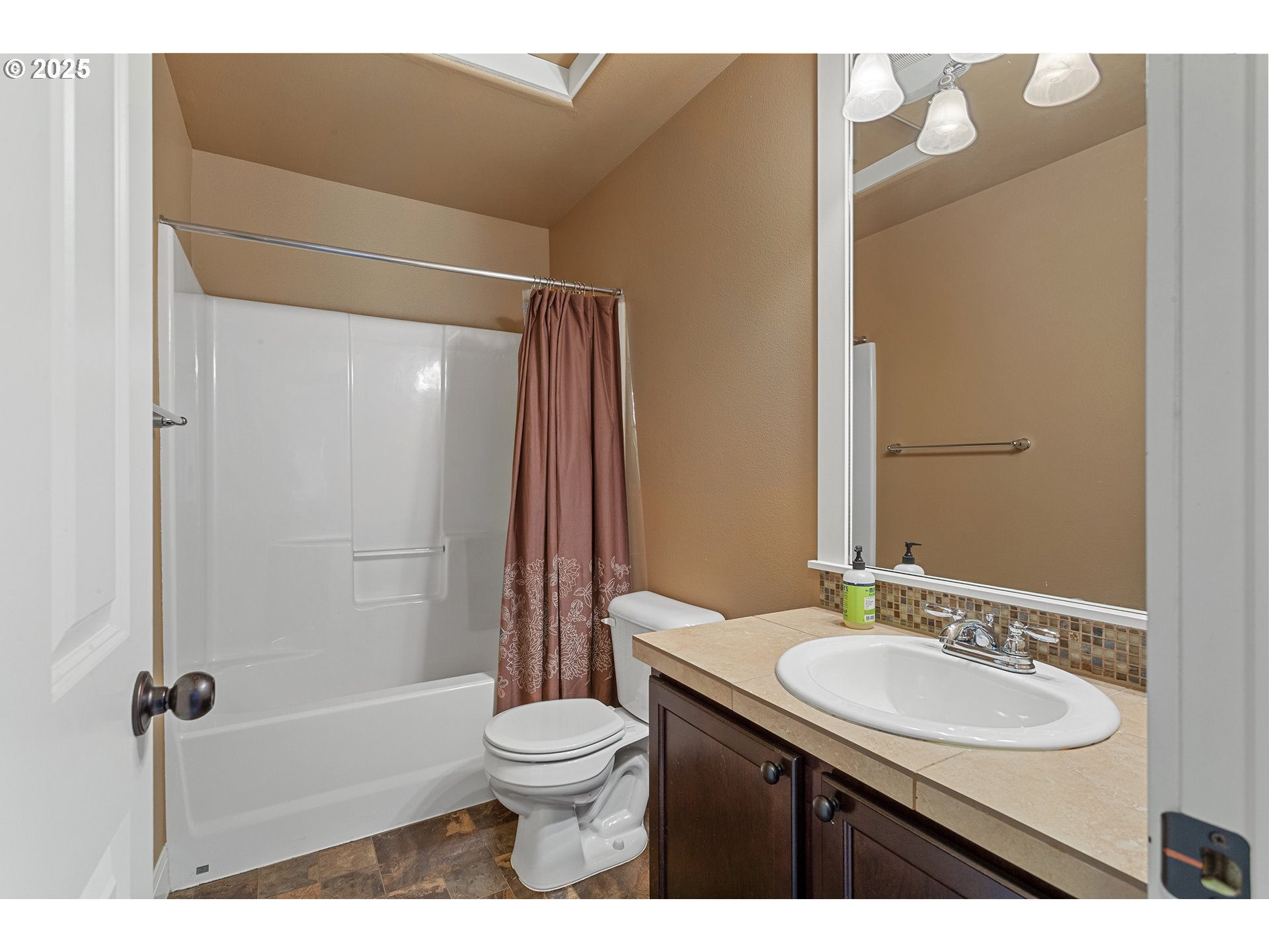 9622 Southwest Everett Terrace Tigard, OR 97223 - Photo 35 of 43 a bathroom with a sink a toilet and shower