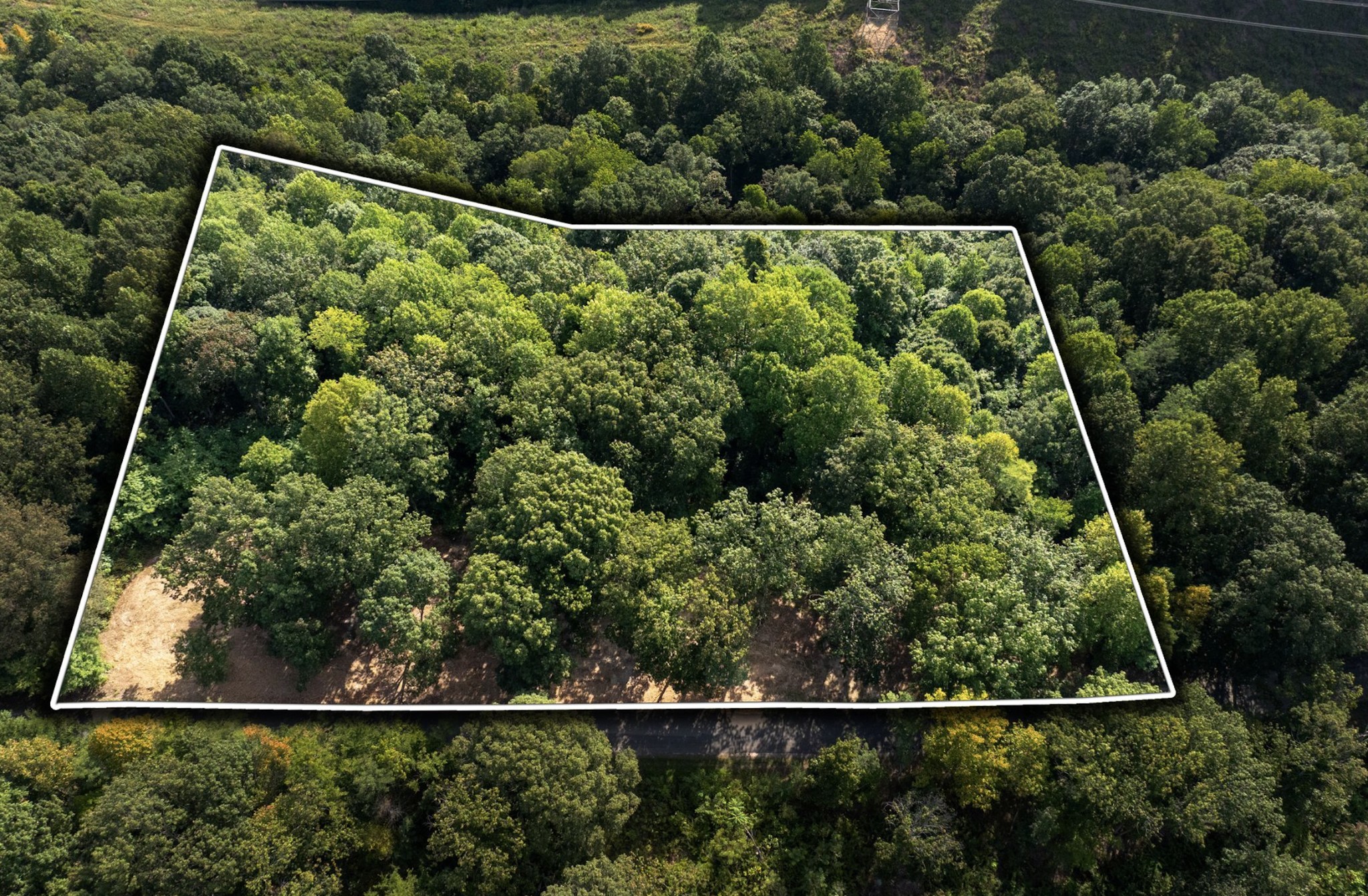 0 Apache Trail Pegram, TN 37143 - Photo 3 of 10 an aerial view of a house with a yard