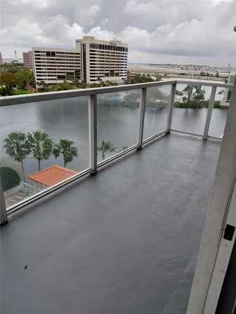 a view of a balcony with an outdoor space