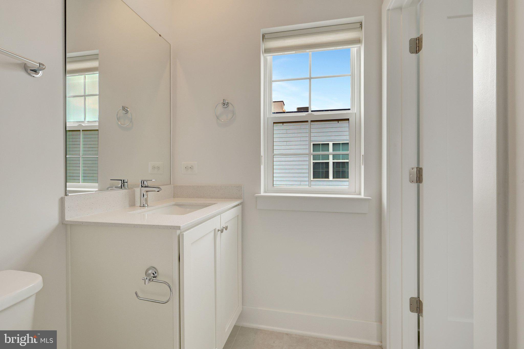 11247 Beaker Street Reston, VA 20190 - Photo 33 of 54 Bright and airy modern bathroom retreat.
