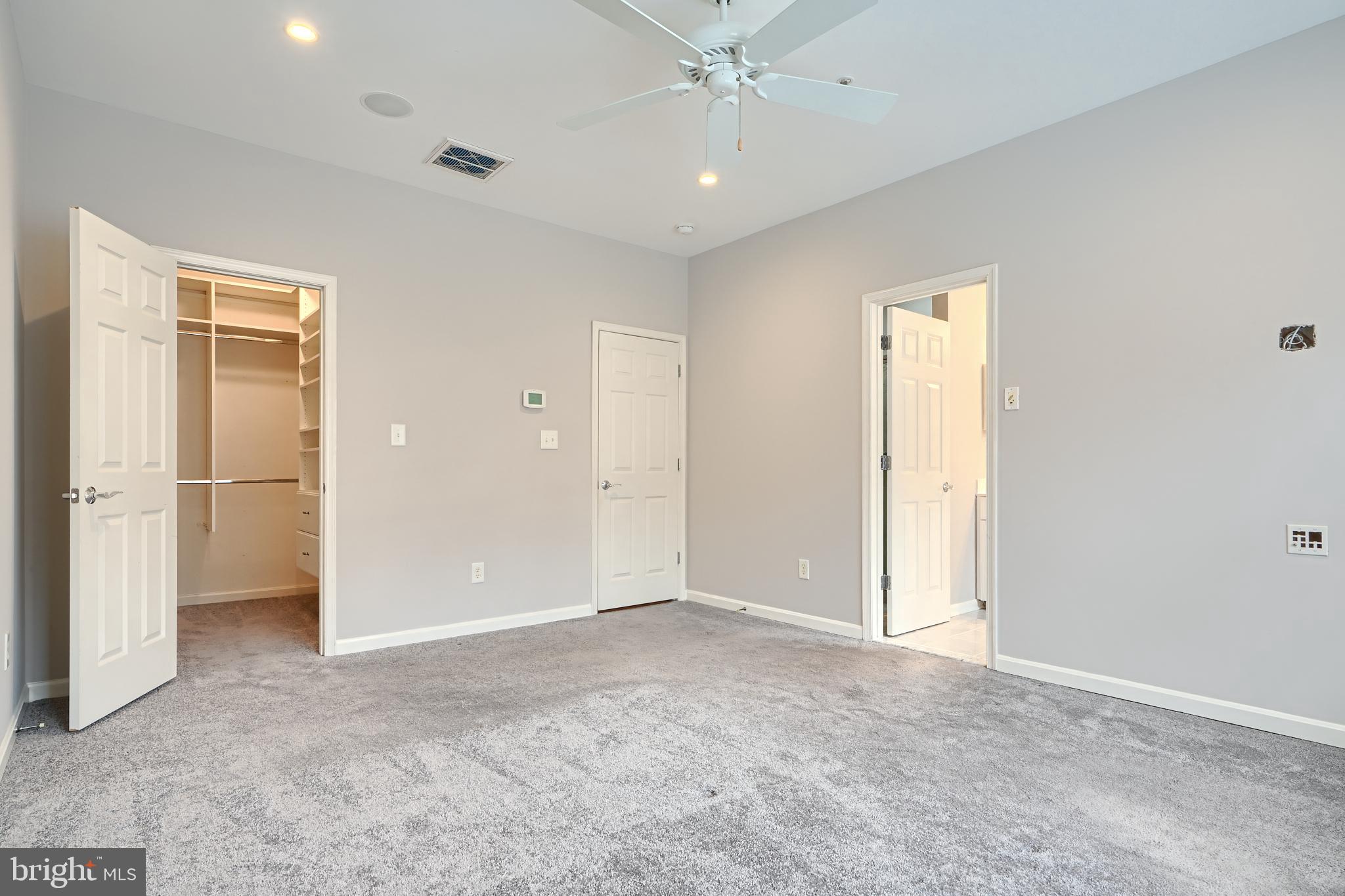 1205 Dockside Circle Baltimore, MD 21224 - Photo 23 of 39 an empty room with fan and entrance