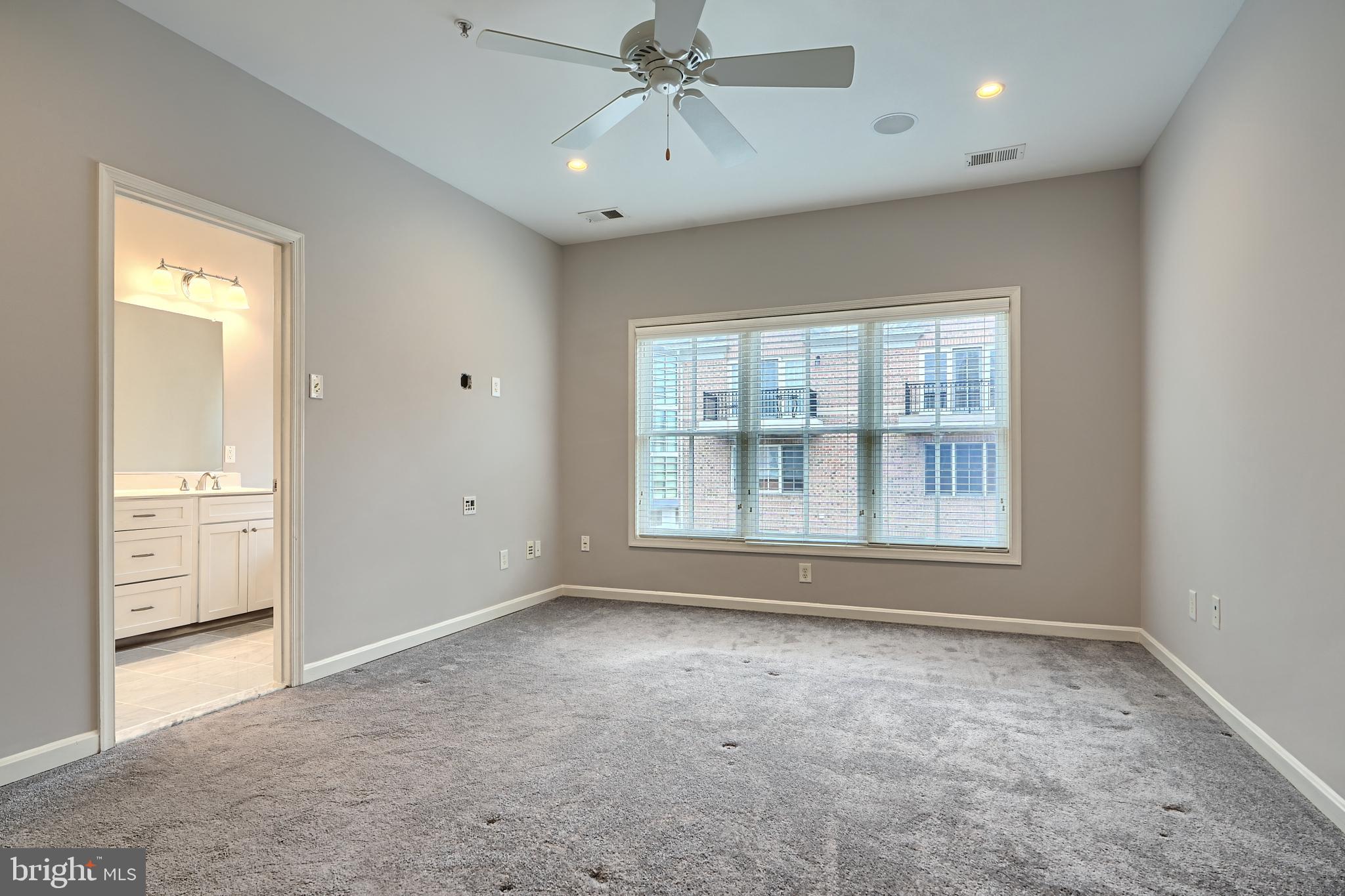 1205 Dockside Circle Baltimore, MD 21224 - Photo 24 of 39 a view of an empty room with a window