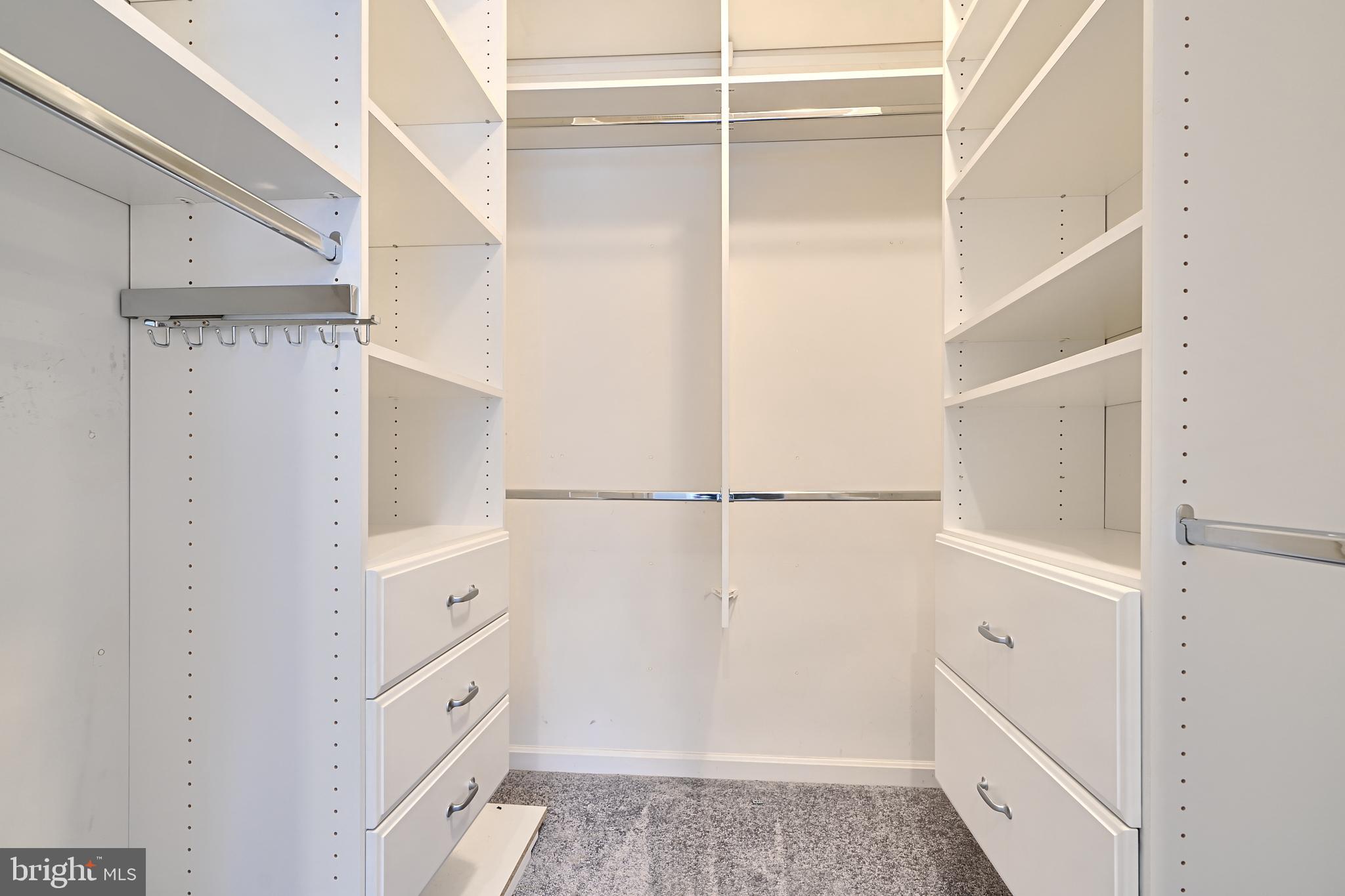 1205 Dockside Circle Baltimore, MD 21224 - Photo 25 of 39 a view of walk in closet with empty racks