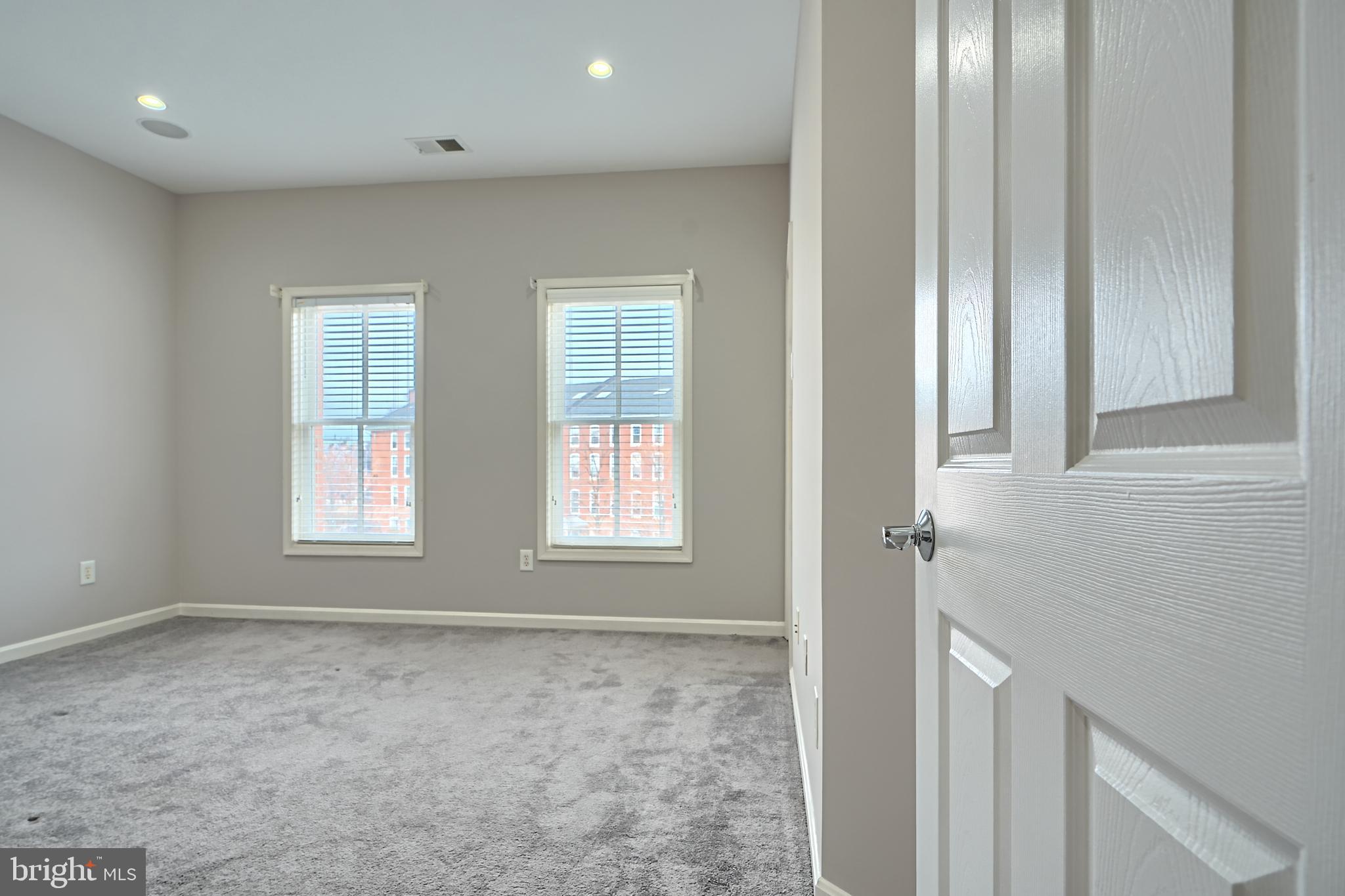 1205 Dockside Circle Baltimore, MD 21224 - Photo 31 of 39 an empty room with windows