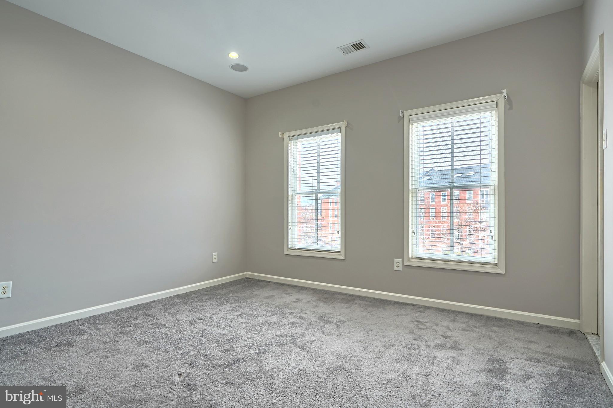 1205 Dockside Circle Baltimore, MD 21224 - Photo 32 of 39 an empty room with windows