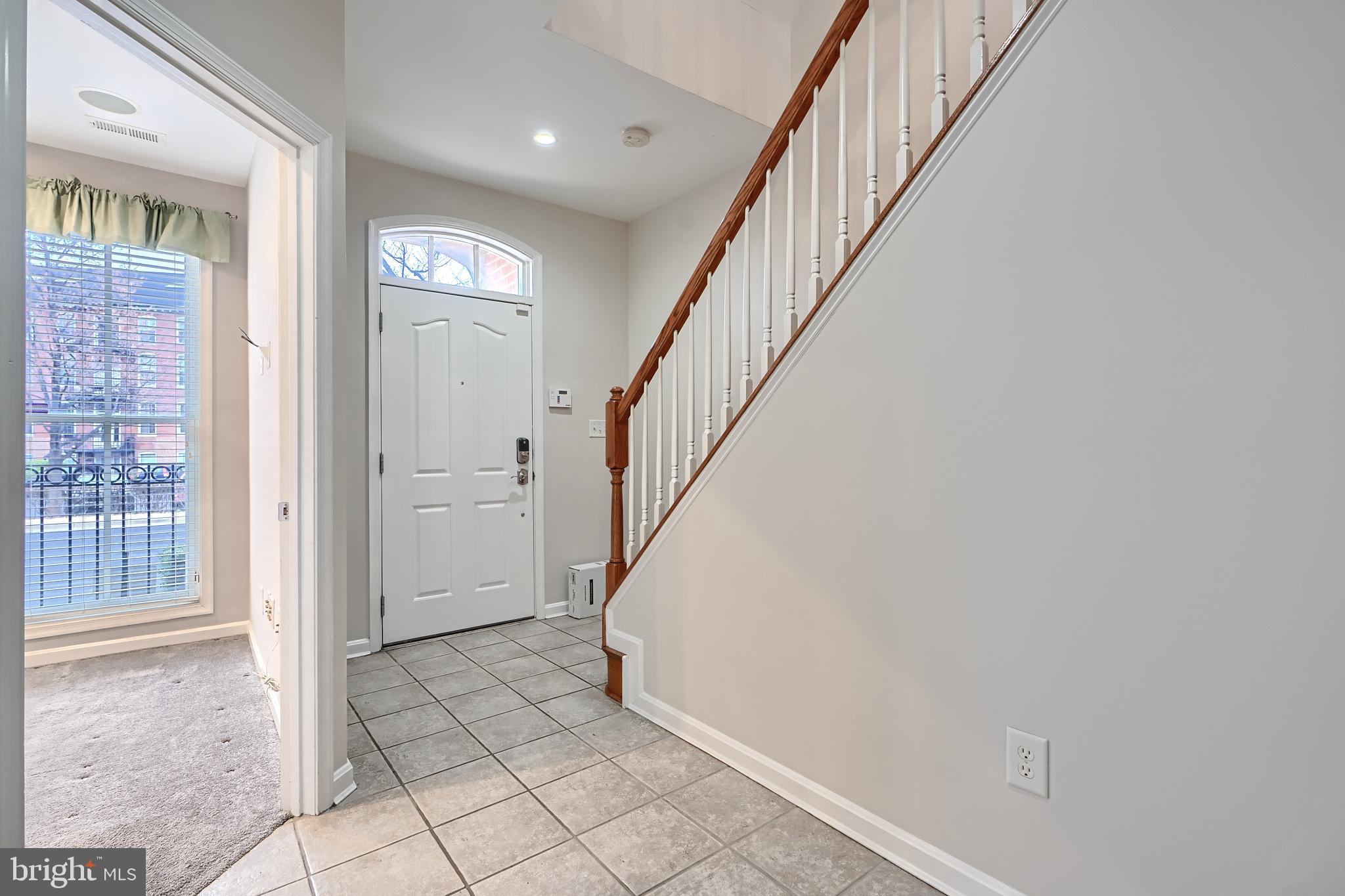 1205 Dockside Circle Baltimore, MD 21224 - Photo 6 of 39 a view of entryway with wooden floor