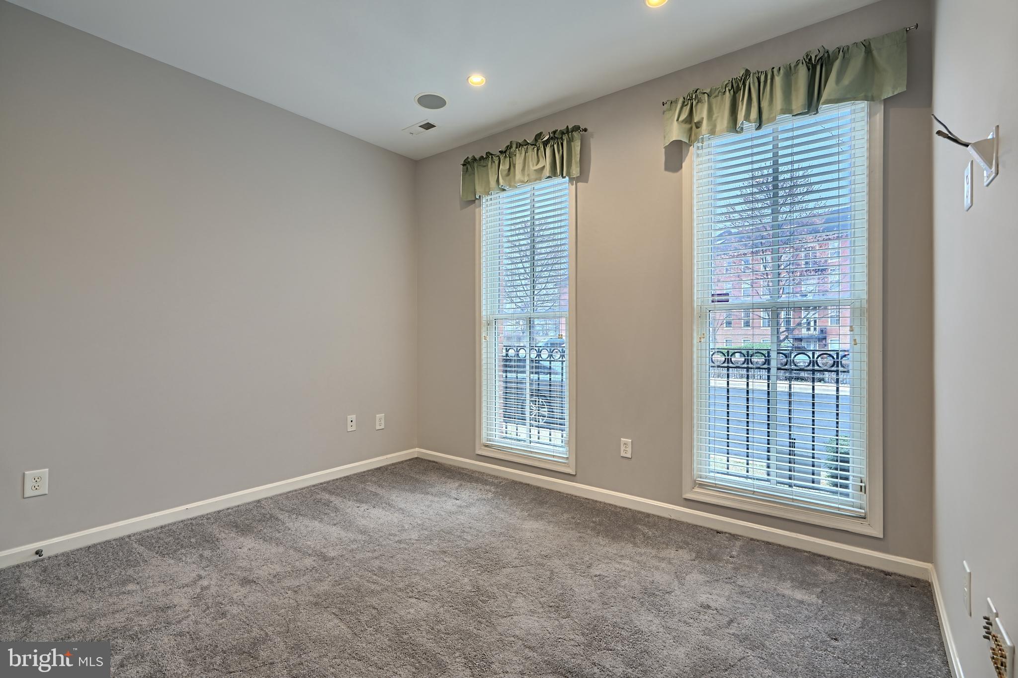 1205 Dockside Circle Baltimore, MD 21224 - Photo 7 of 39 a view of an empty room with a window