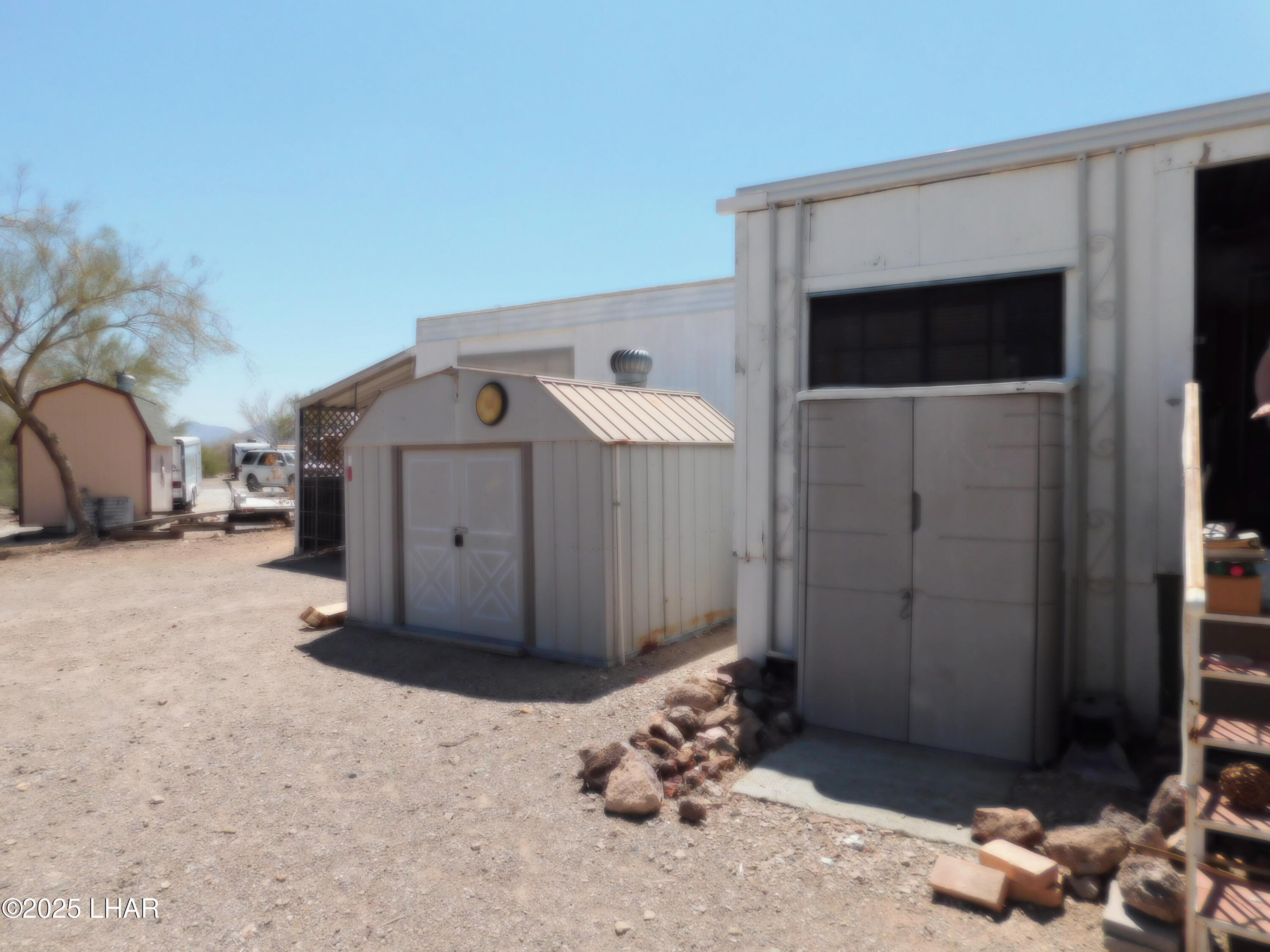 1240 Acacia Road, Unit 14 Quartzsite, AZ 85346 - Photo 32 of 33 Storage sheds on the north side