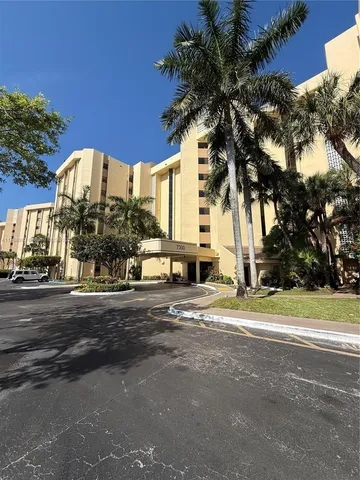 a view of a building with a street