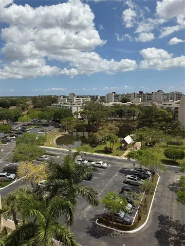 a room with furniture pool table and projector room