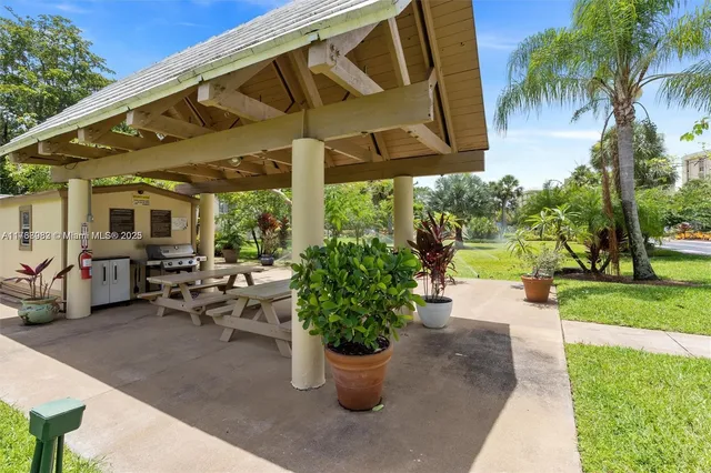 a view of a terrace with a lake view