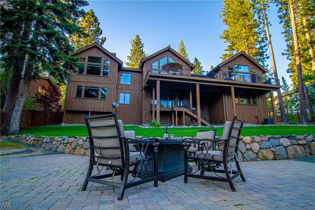 627 Crystal Peak Road Incline Village, NV 89451 - Photo 1 of 4 a view of a chair and table in backyard of the house