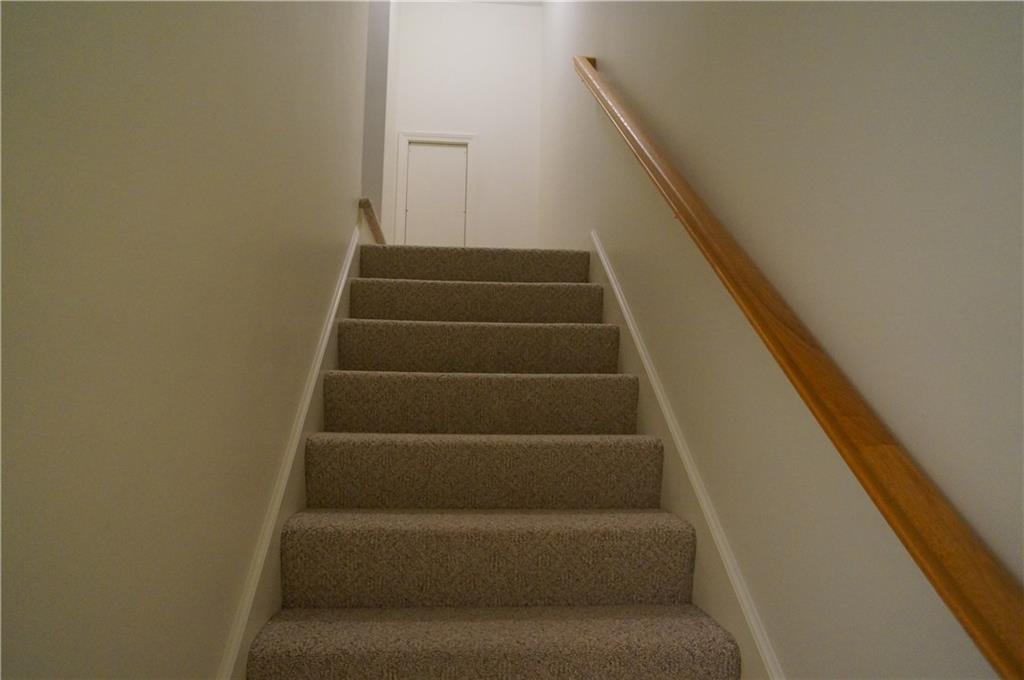 120 Starbird Road, Unit 11 Portland, ME 04102 - Photo 23 of 26 Staircase to 3rd floor finished room