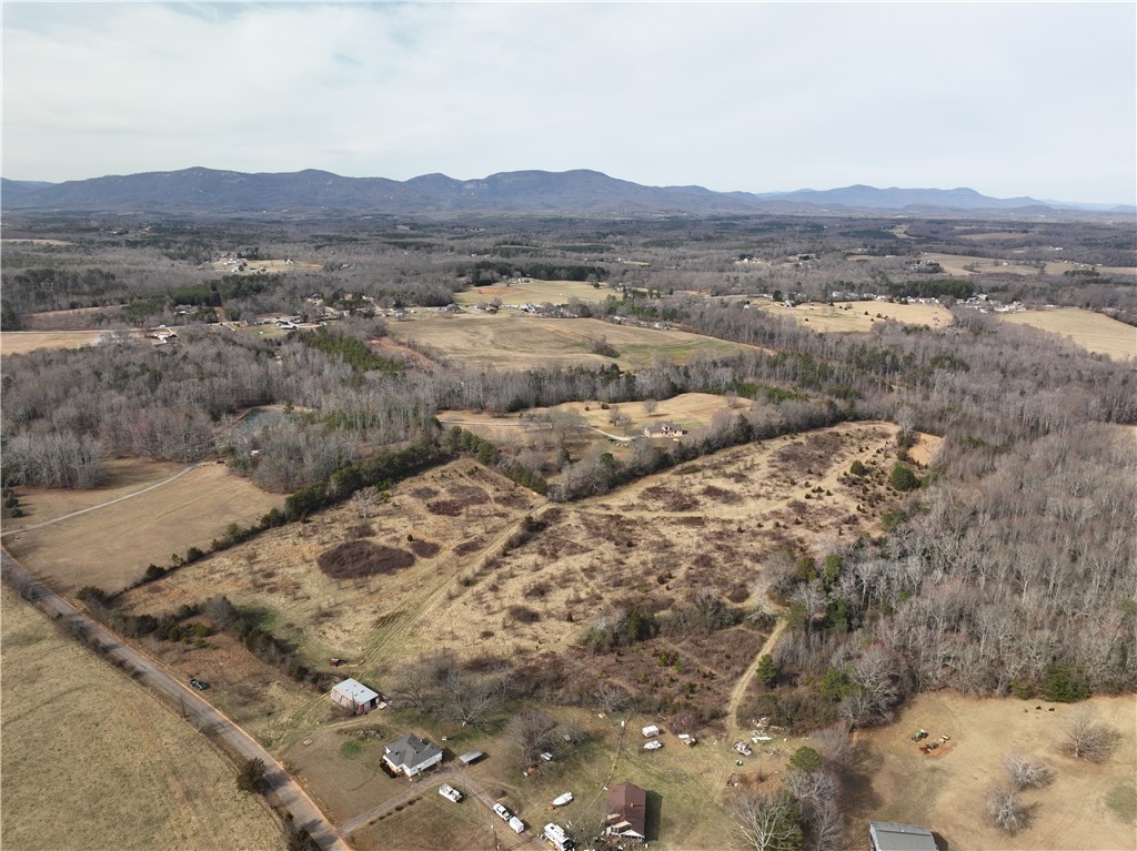 4525 Babb Road Greer, SC 29651 - Photo 12 of 30 This expansive lot offers panoramic mountain views and serene natural surroundings, perfect for your dream retreat.