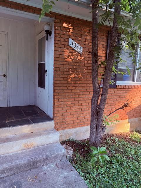 3341 Colonial Avenue Southwest, Unit 3341 Roanoke, VA 24018 - Photo 1 of 10 a brick building with a tree in front of it