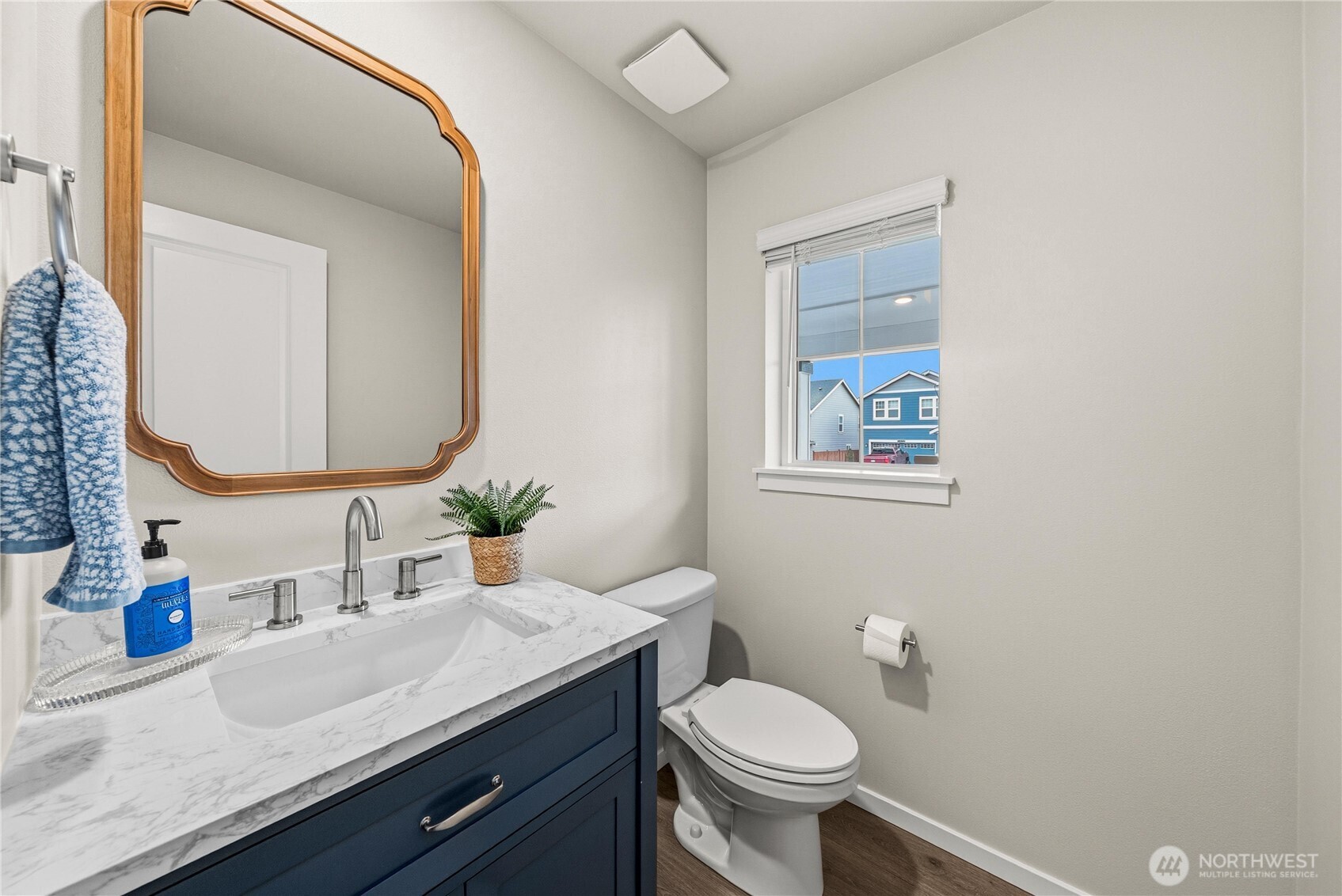 1081 Southwest Pendleton Way Port Orchard, WA 98367 - Photo 14 of 40 a bathroom with a granite countertop toilet sink and mirror