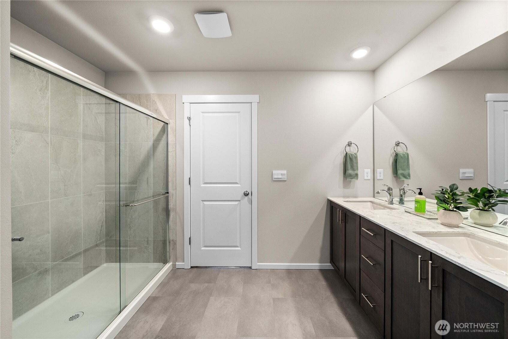 1081 Southwest Pendleton Way Port Orchard, WA 98367 - Photo 19 of 40 a bathroom with a shower sink and mirror