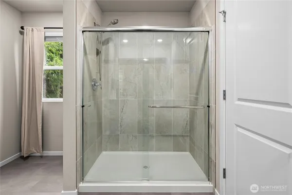 a bathroom with a bath tub