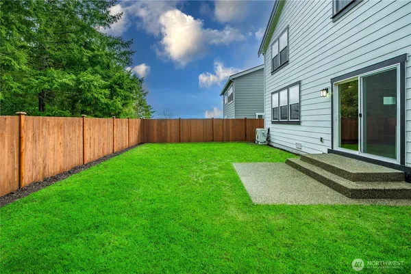 a view of a backyard with a garden