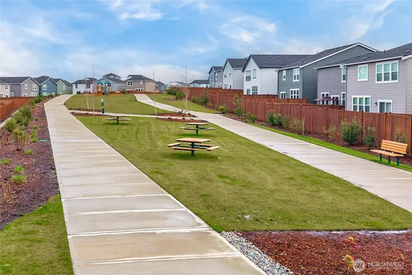 a view of swimming pool with a yard