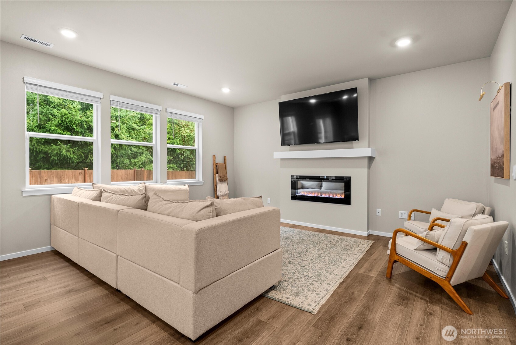 1081 Southwest Pendleton Way Port Orchard, WA 98367 - Photo 4 of 40 a living room with furniture and a fireplace