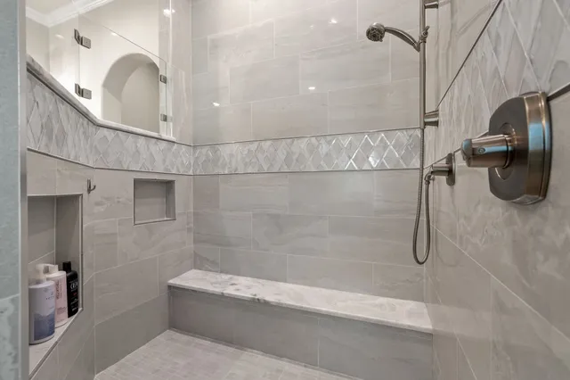 a living room with furniture pool table and a fireplace