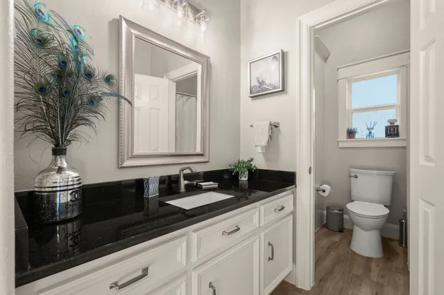 a view of a park with lots of trees and entertaining space