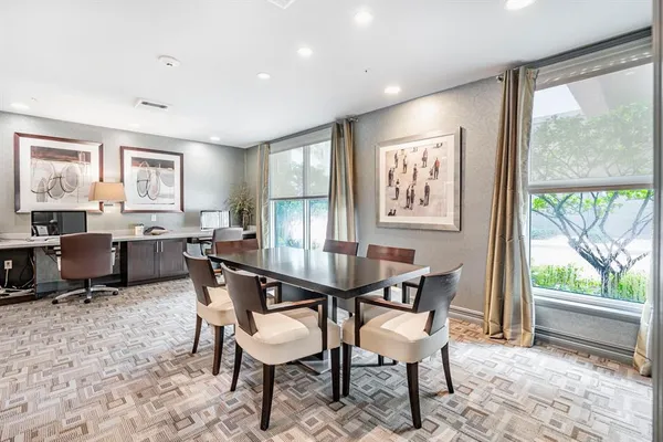 a room with gym equipment and a large window