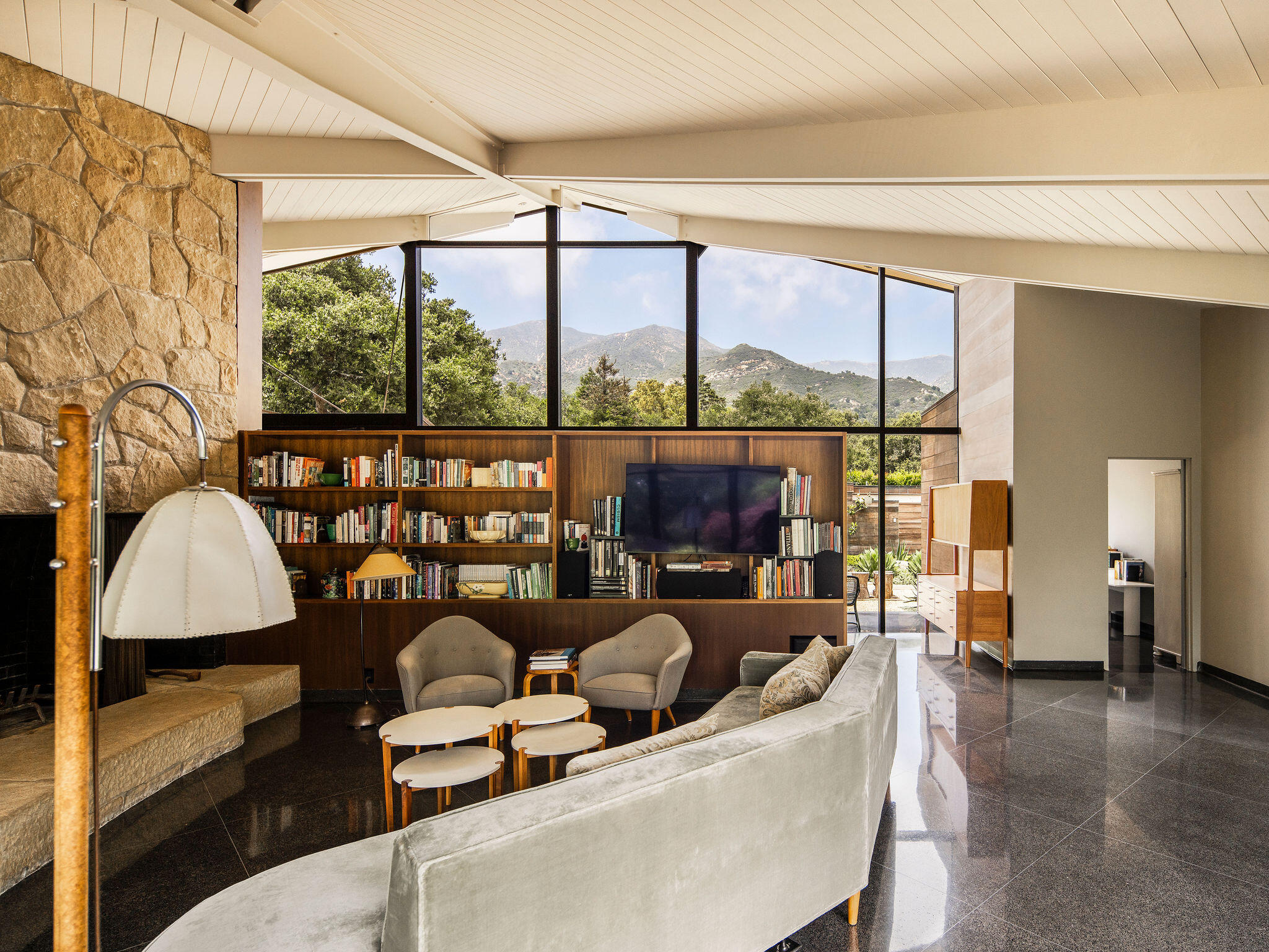 650 San Ysidro Road Montecito, CA 93108 - Photo 17 of 54 a living room with fireplace furniture and a large window