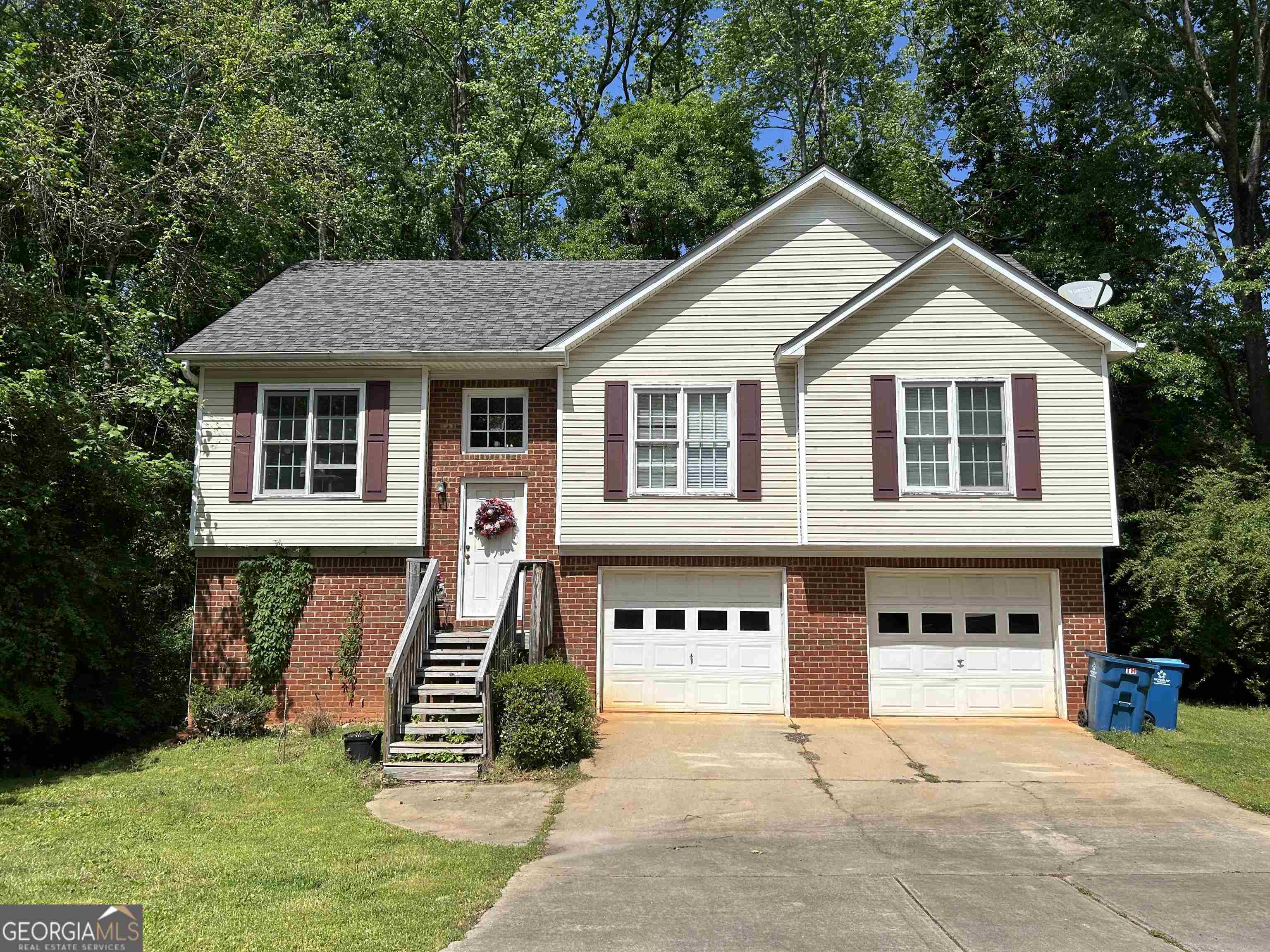 174 Spring Lake Drive Athens, GA 30605 - Photo 1 of 10 a front view of a house with a yard