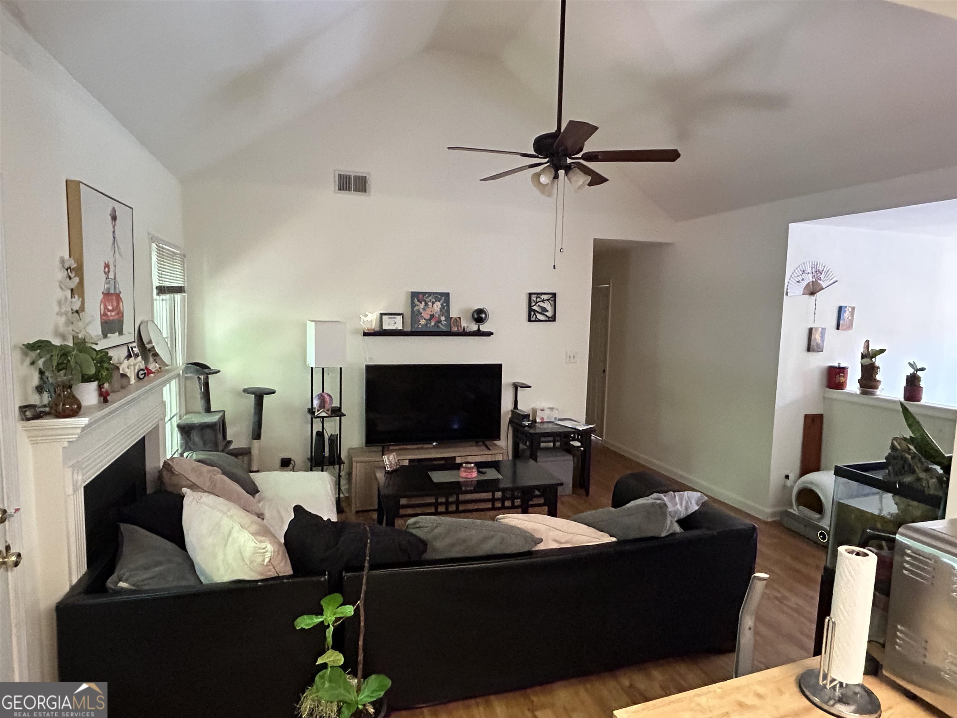 174 Spring Lake Drive Athens, GA 30605 - Photo 6 of 10 a living room with furniture and a flat screen tv