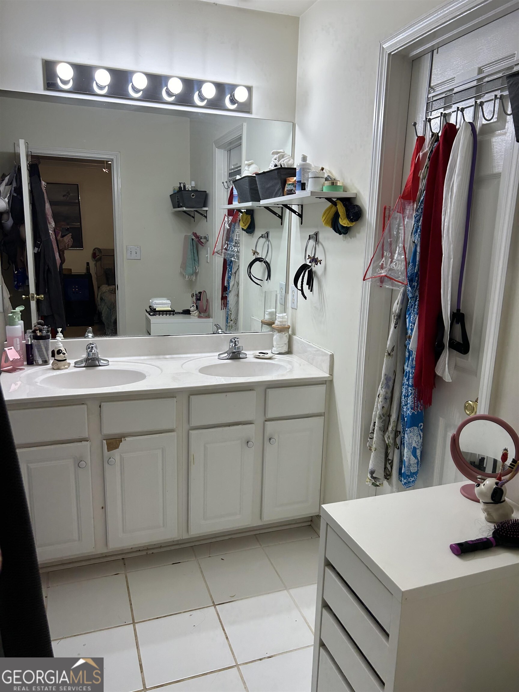 174 Spring Lake Drive Athens, GA 30605 - Photo 10 of 10 a bathroom with a sink vanity and mirror