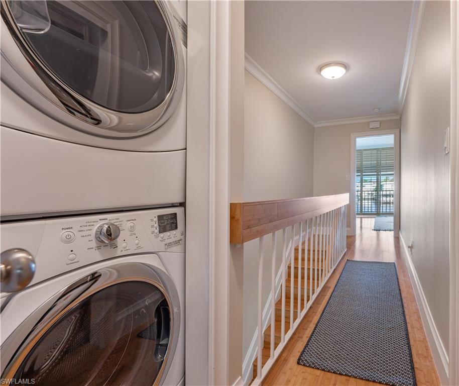 800 River Point Drive, Unit 207 Naples, FL 34102 - Photo 36 of 47 a view of washer and dryer in a utility room