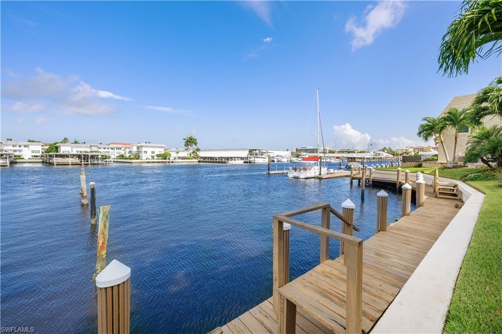 800 River Point Drive, Unit 207 Naples, FL 34102 - Photo 46 of 47 a view of a terrace with chairs