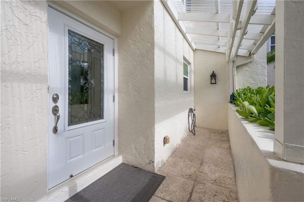 800 River Point Drive, Unit 207 Naples, FL 34102 - Photo 8 of 47 a view of an entryway