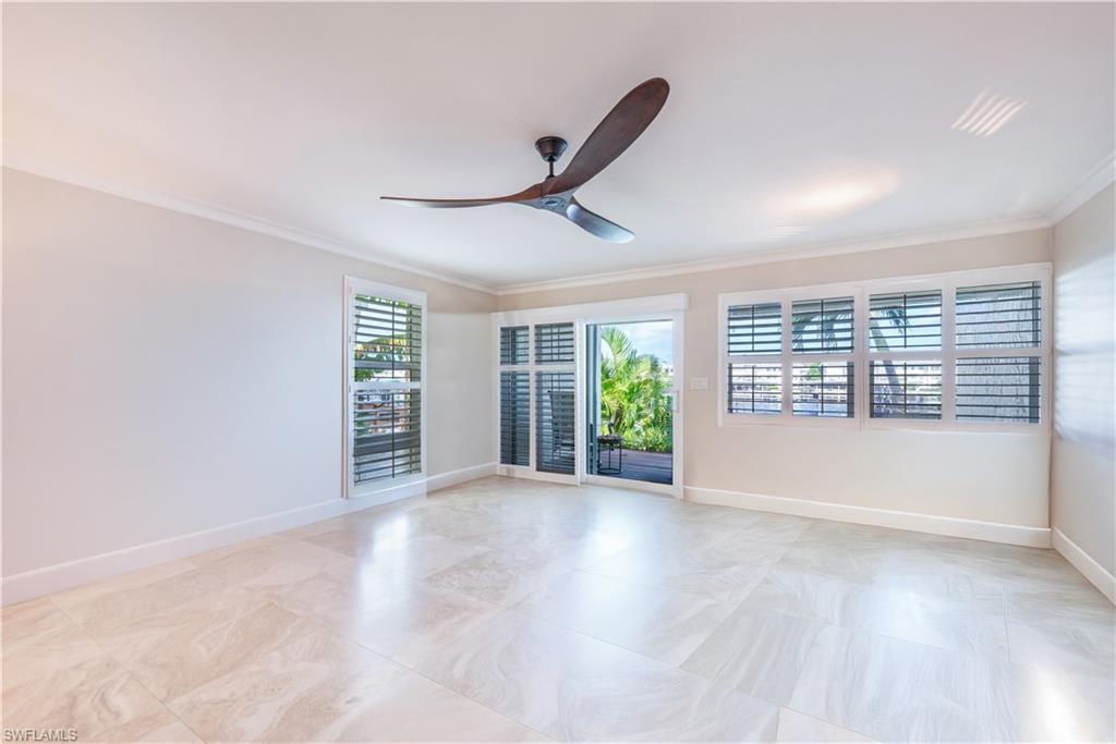 800 River Point Drive, Unit 207 Naples, FL 34102 - Photo 10 of 47 a view of an empty room with a window