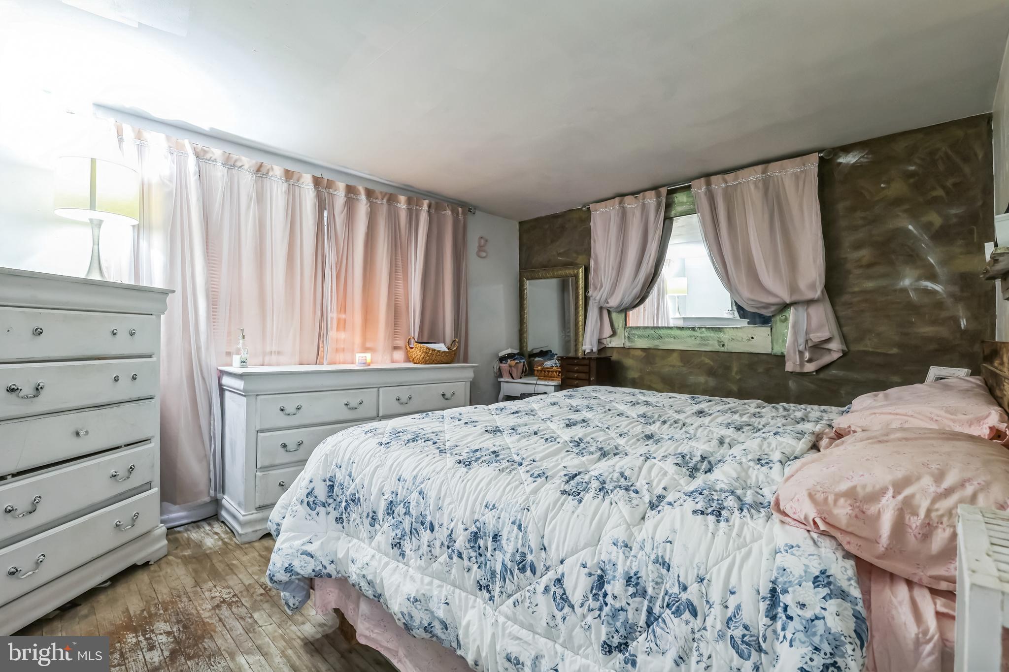 1510 Daws Road Blue Bell, PA 19422 - Photo 15 of 25 a bedroom with a bed and a window