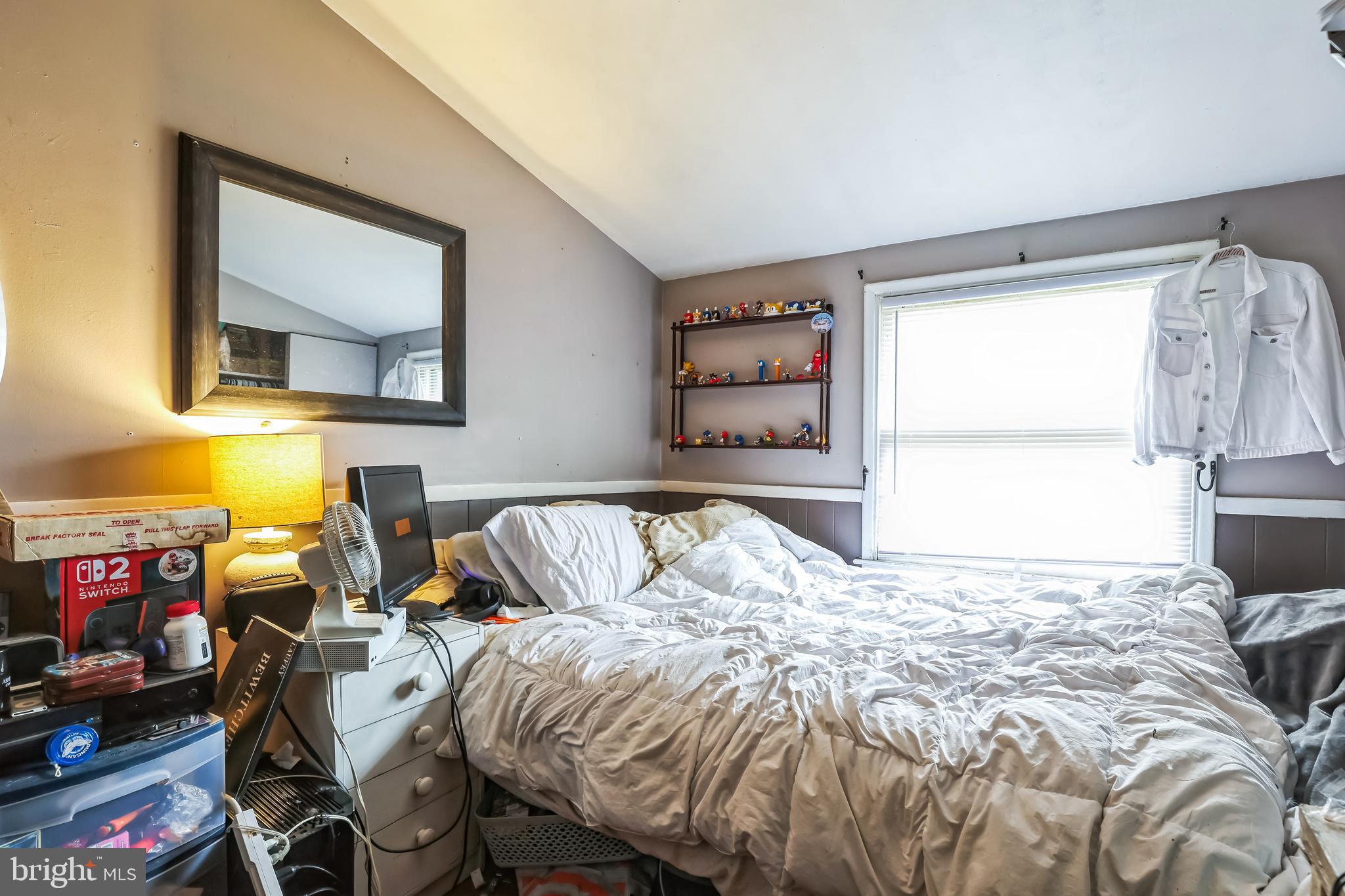 1510 Daws Road Blue Bell, PA 19422 - Photo 17 of 25 a bed sitting in a bedroom next to a window