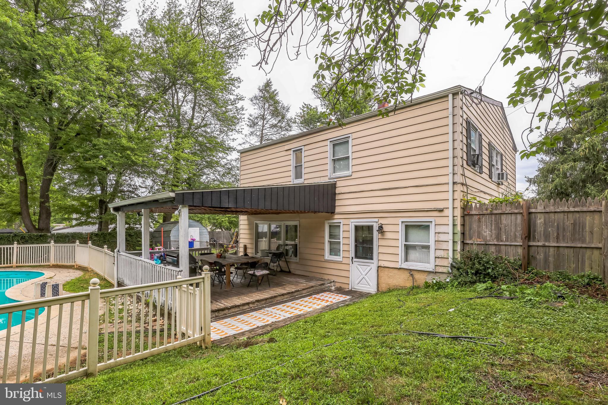 1510 Daws Road Blue Bell, PA 19422 - Photo 21 of 25 a view of a house with a small deck and furniture