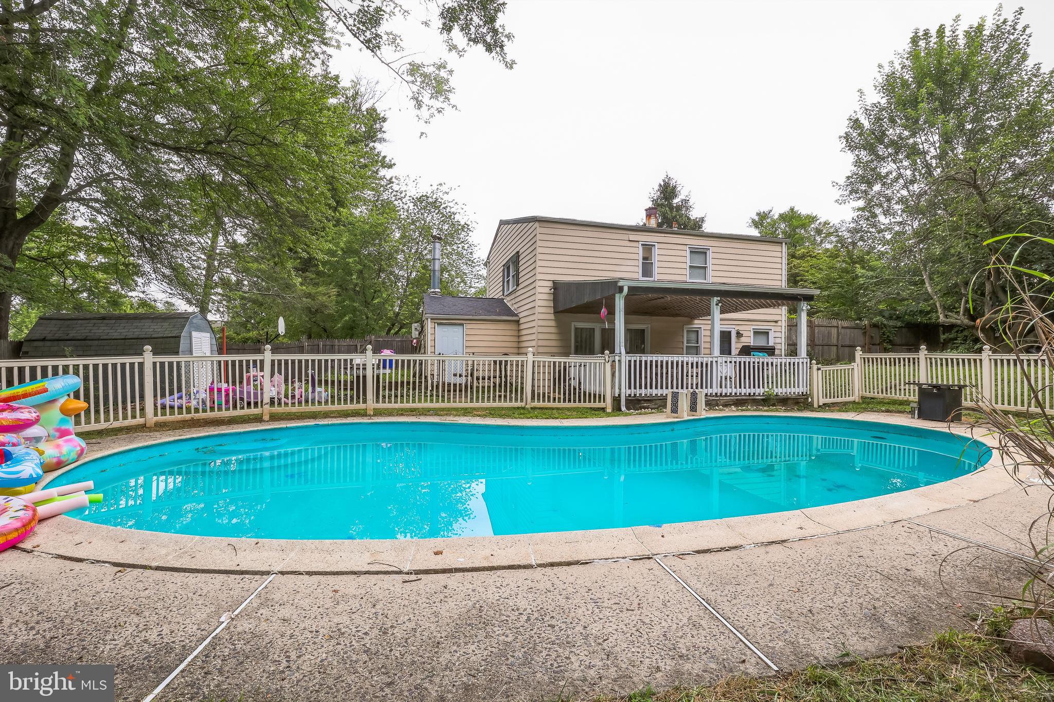 1510 Daws Road Blue Bell, PA 19422 - Photo 24 of 25 a view of a house with a swimming pool