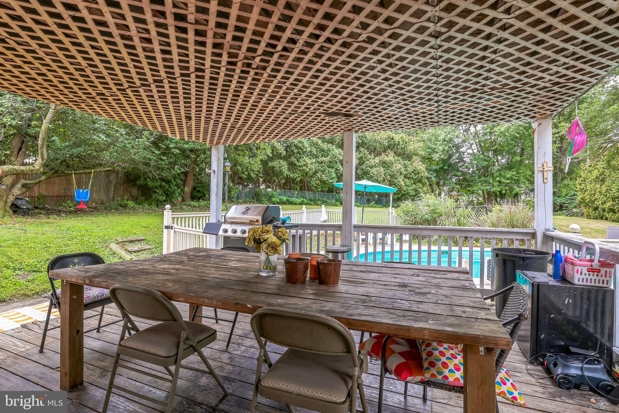 1510 Daws Road Blue Bell, PA 19422 - Photo 5 of 25 a view of a chairs and table in patio with a wooden fence
