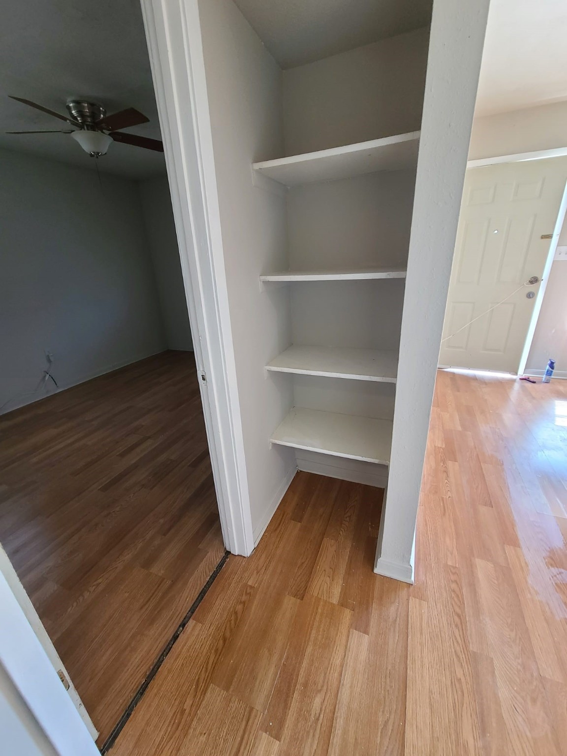 500 Austin Road, Unit 3 Eagle Lake, TX 77434 - Photo 7 of 11 a view of a room with wooden floors and led lights