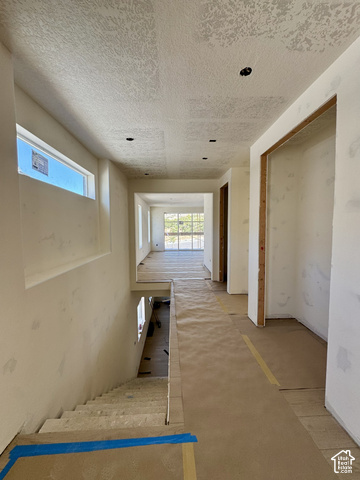 567 East Rimrock Lane Heber City, UT 84032 - Photo 2 of 16 Recessed ceiling lighting, horizontal window, open doorways, and an interior staircase