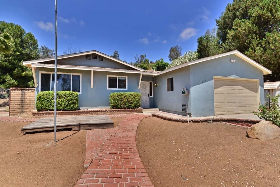 11319 Posthill Road Lakeside, CA 92040 - Photo 1 of 25 Large front area with view back towards the Mts.