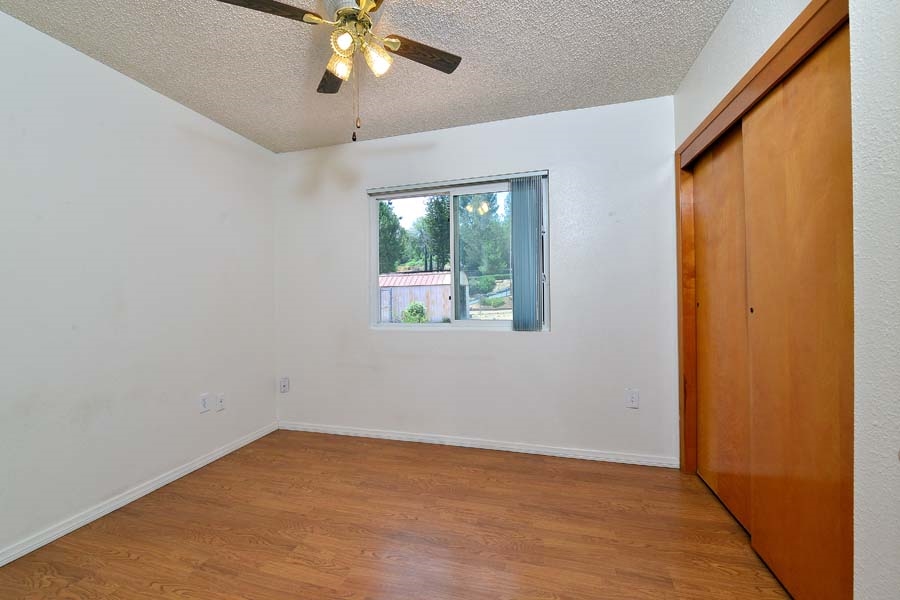11319 Posthill Road Lakeside, CA 92040 - Photo 14 of 25 First common Bedroom overlooks the south side of the property. Plenty of space for all.
