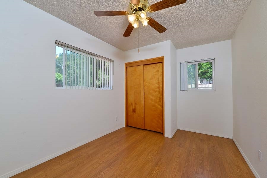 11319 Posthill Road Lakeside, CA 92040 - Photo 16 of 25 Common bed 2 overlooks the south and west walls of the property and has plenty of natural light.