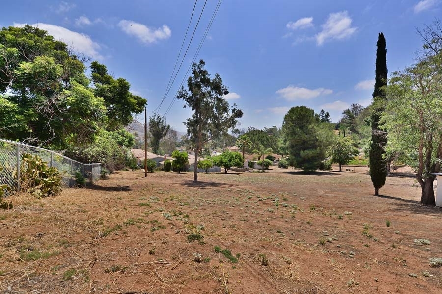 11319 Posthill Road Lakeside, CA 92040 - Photo 21 of 25 From the far corner of the fenced lot you can hardly see the back of the house. wow!